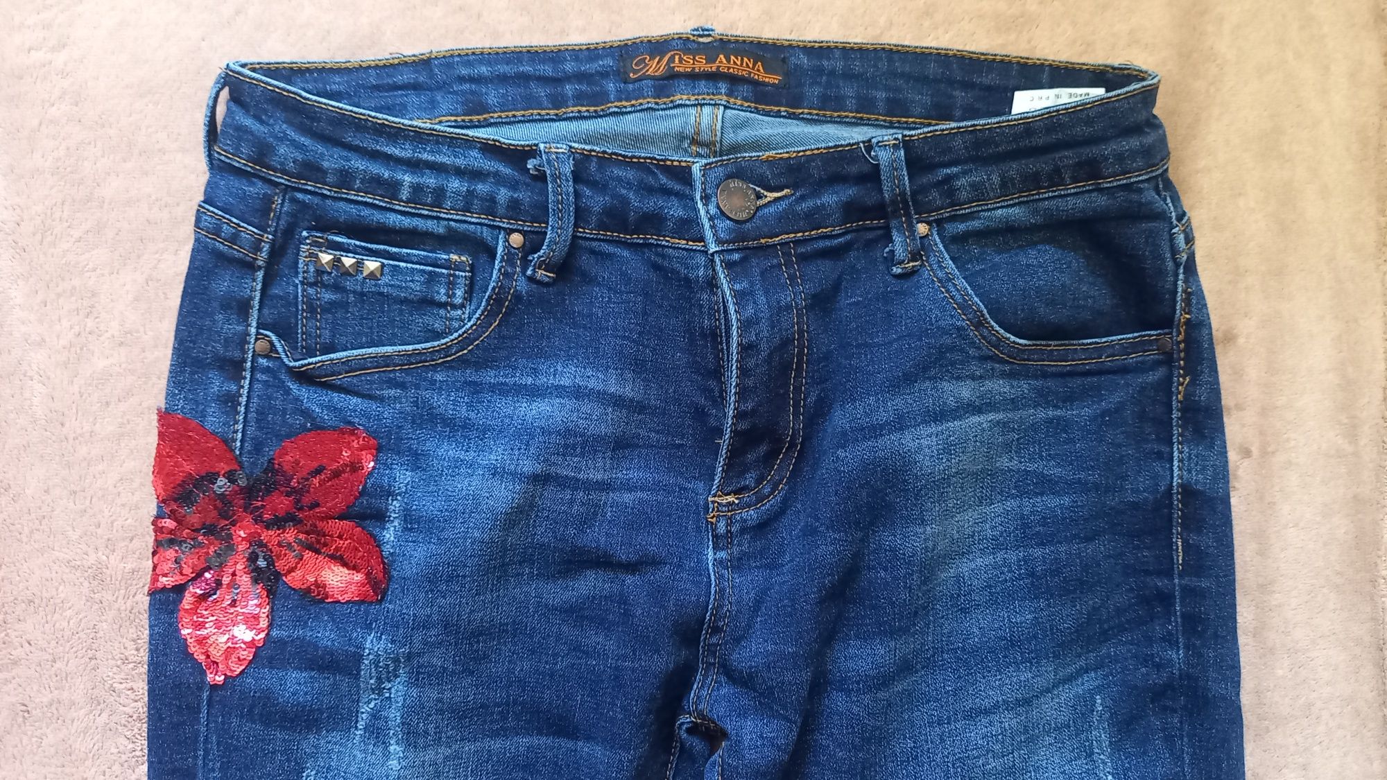 Spodnie jeans r.38/40 zdobione kwiaty