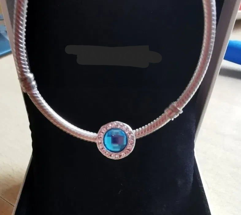 Srebrny charm, zawieszka z błękitny kamieniem