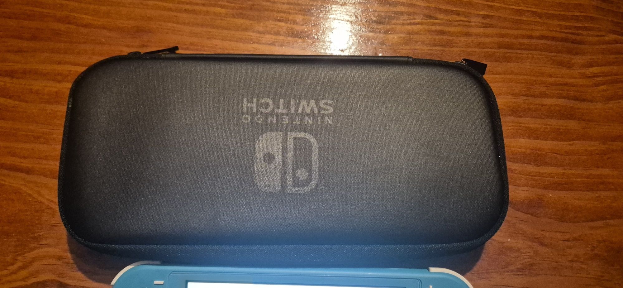 Nintendo switch lite + 3 Jogos