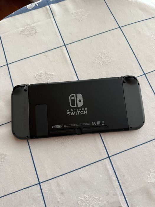 Nintendo switch + jogo + bolsas + película + cartão de memoria