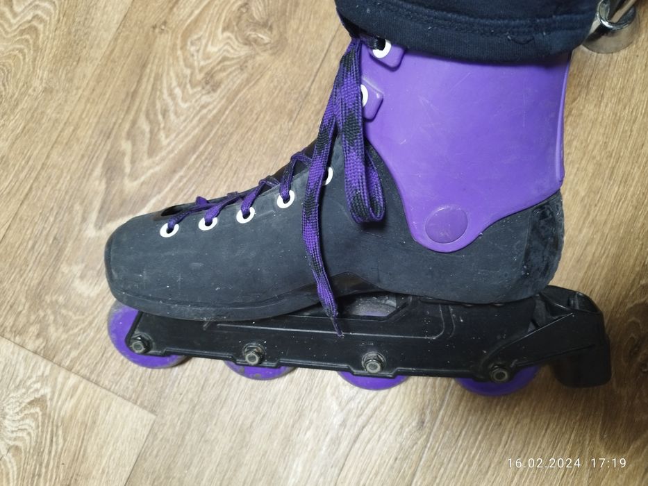 Роликовые коньки