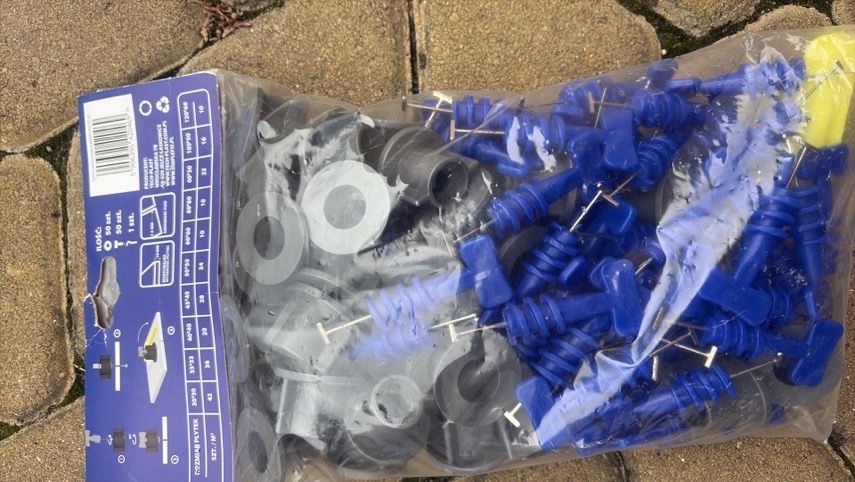 Система вирівнювання плитки