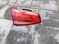 Lampa tył tylna klapy bagażnika lewa strona Volkswagen Passat B8 Sedan
