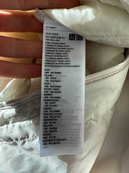 Молочна пухова безрукавка Uniqlo ultra light down