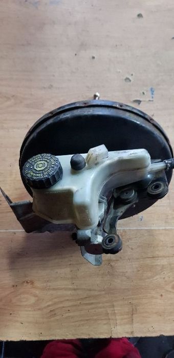 VOLKSWAGEN GOLF III SERWO HAMULCOWE 1H1614101G