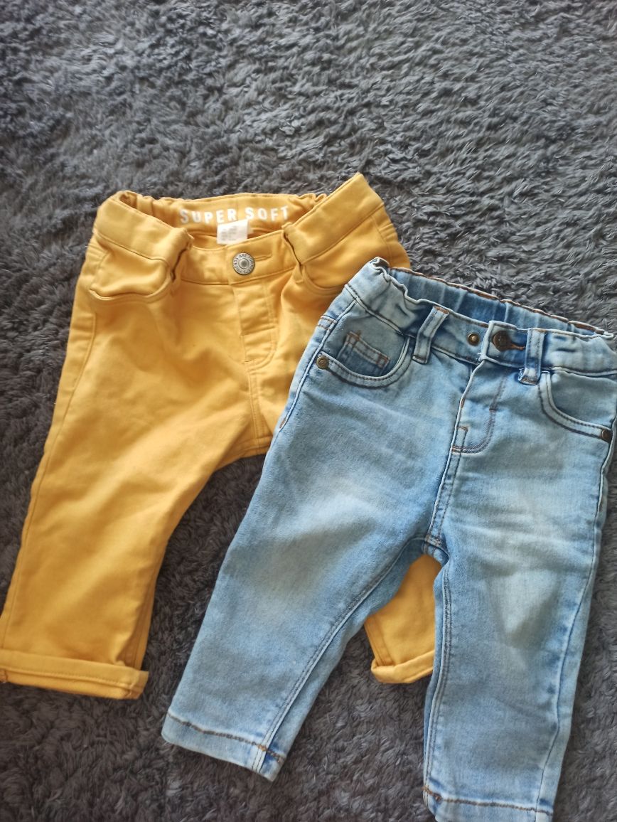 Dwie pary spodni jeansowych 74