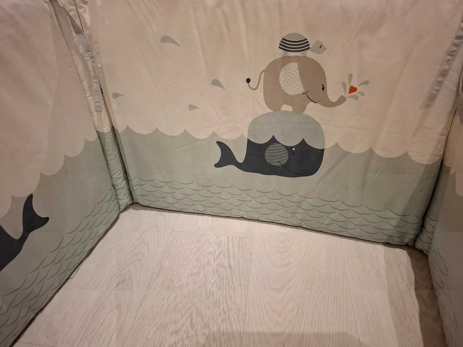 Resguardo de cama de bebé. Como novo. Dentro do saco original