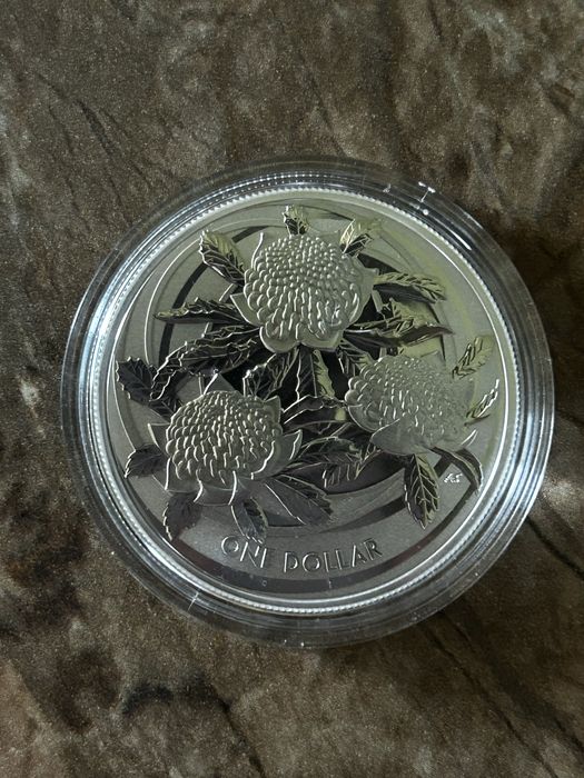 Серебряная монета цветы Австралии