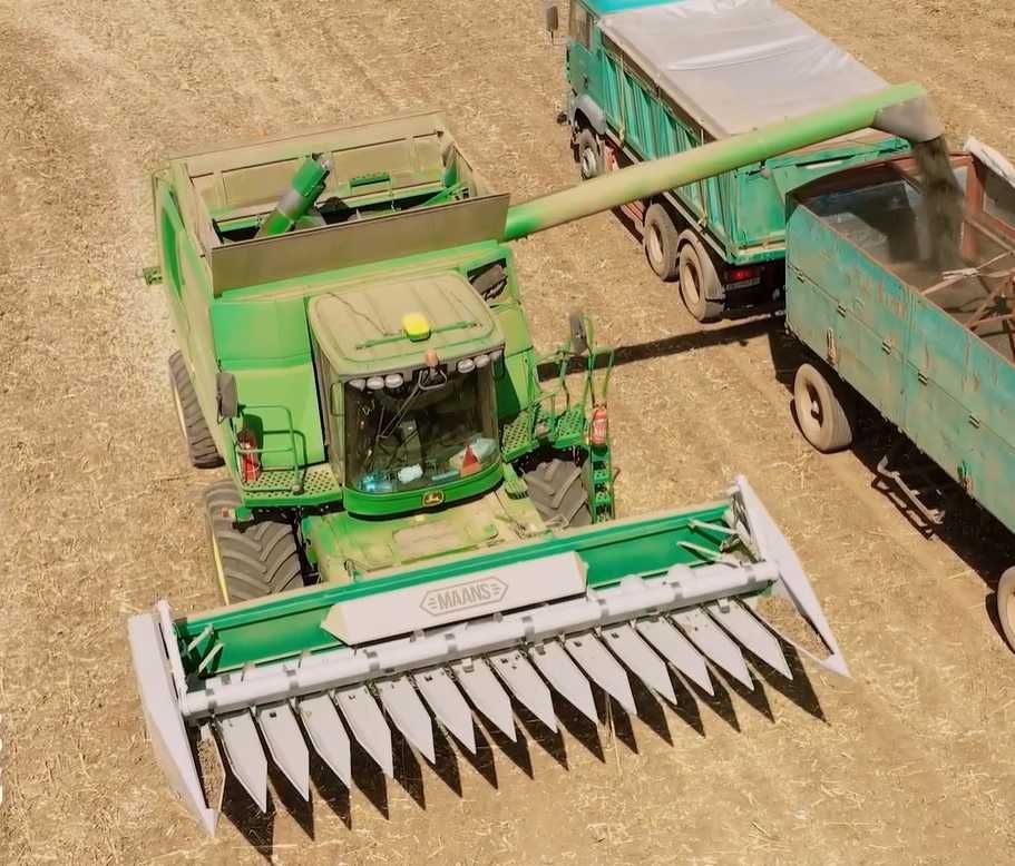 Жатка соняшникова Maans S під Клаас, Нью Холланд (Claas, New Holland).