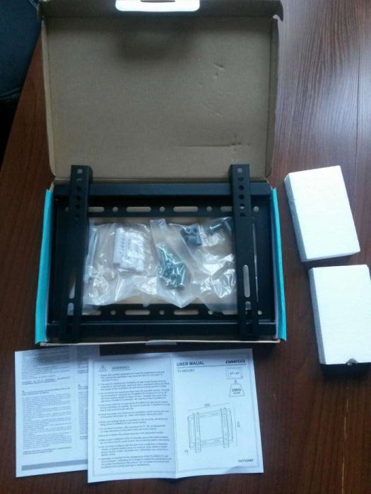 Tani i dobry Uchwyt Ścienny na TV otwory mocowania max 20x20cm