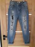 Spodnie jeans z dziurami wysoki stan