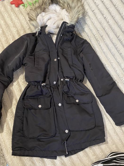 Зимова куртка з стяжками