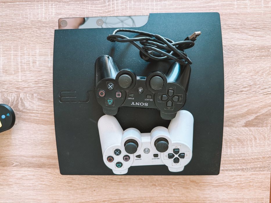 Playstation 3 Slim + 2 comandos + Jogos