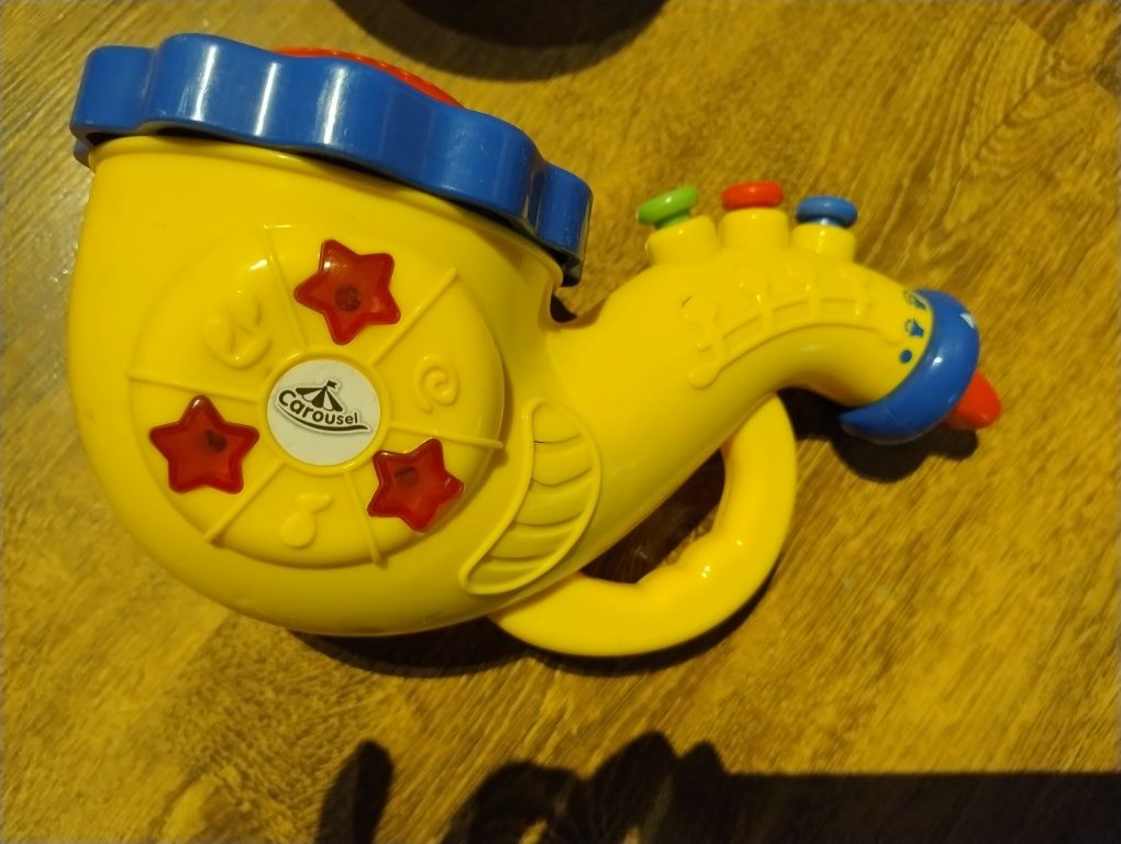 Trąbka Carousel dla dziecka z dźwiękami i światłami