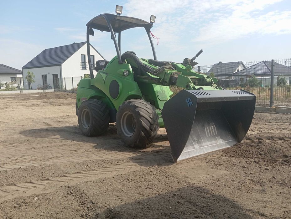 Zakładanie trawnika równanie terenu glebogryzarka kosiarka nawodnienia