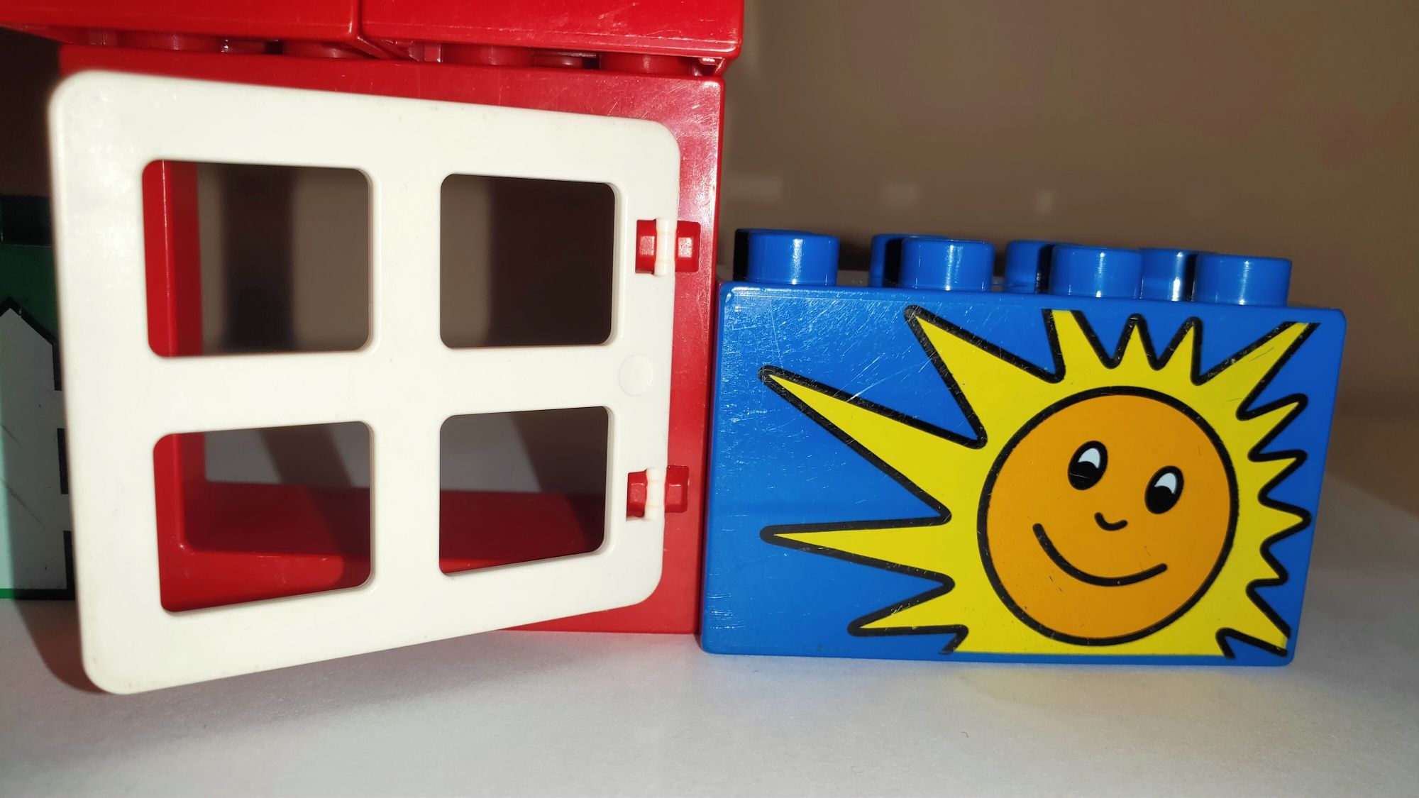 Klocki LEGO Duplo kotek płot domek słońce