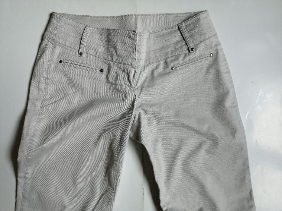 CAMAIEU eleganckie spodnie jasno szare xs 34