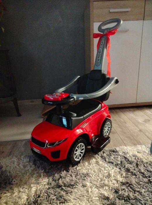Duży Jeździk Chodzik Pchacz Autko Zabawka Interaktywna dla Dzieci