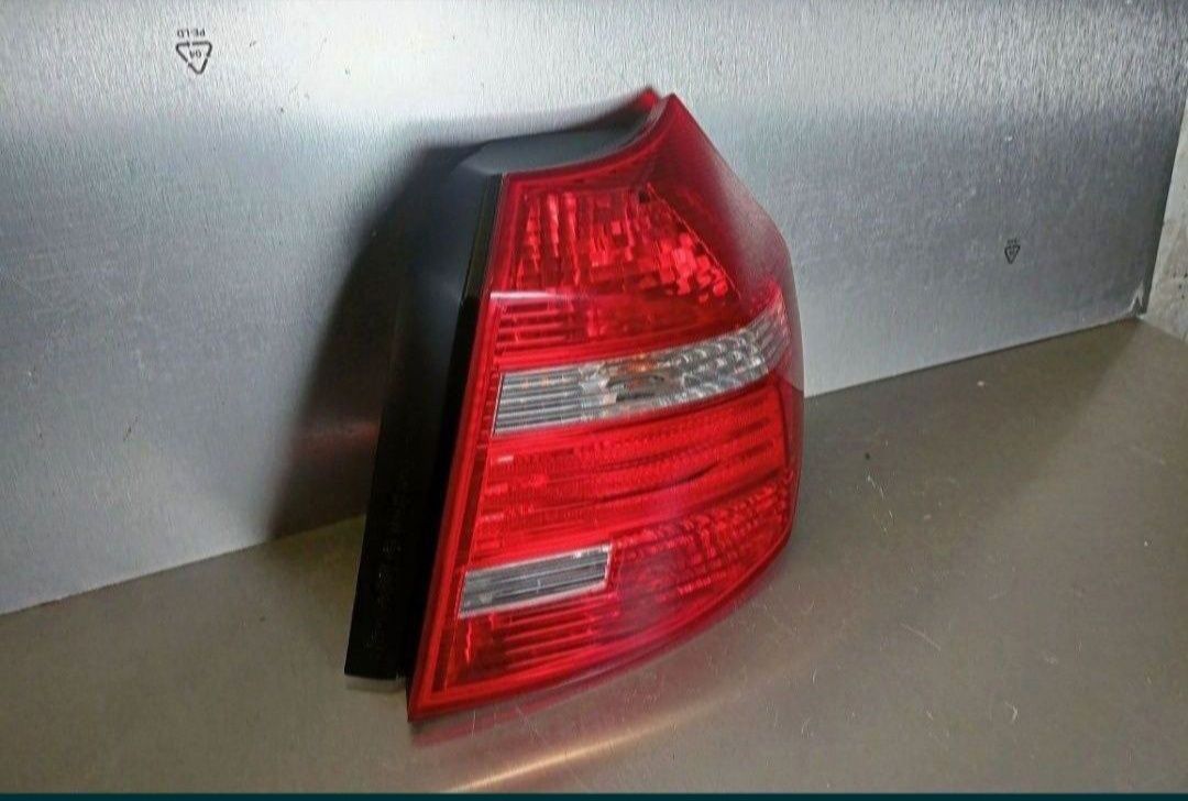 BMW 1 E87 E81 lift FL 07- lampa prawy tył prawa tylna EU igła