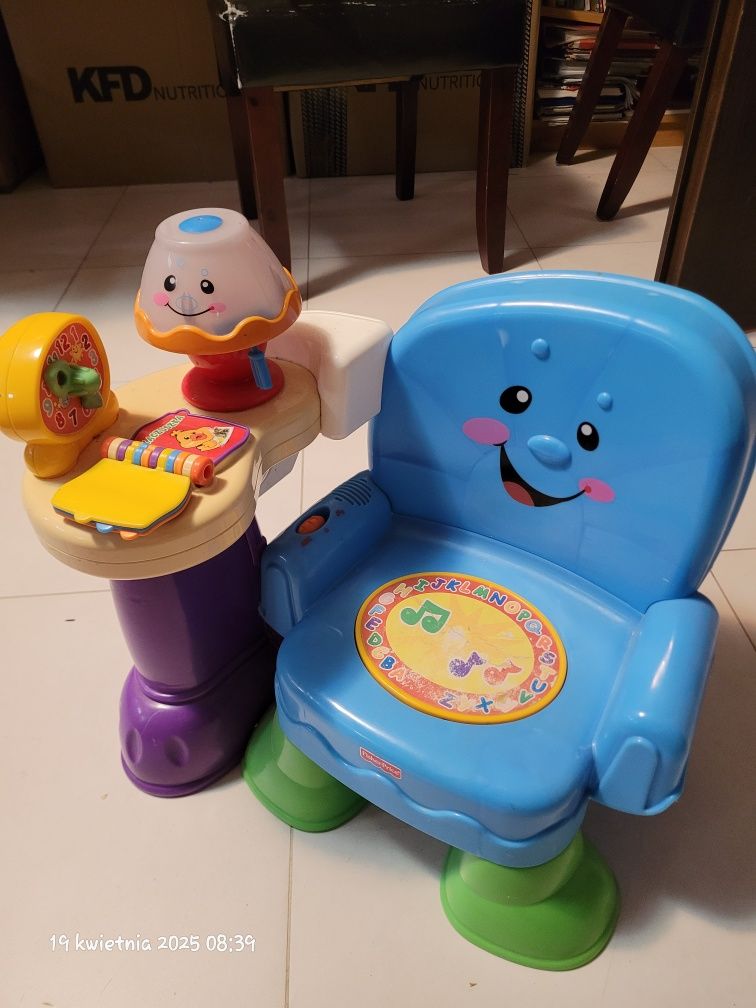 krzesełko grające uczyddełko Fisher Price