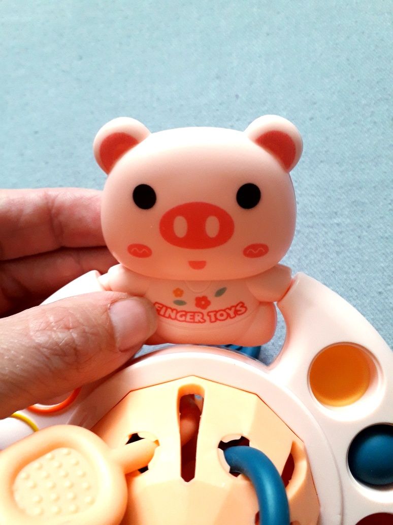Розвиваюча іграшка 5 в 1 сенсорна тактильна нова "свинка на нло" игруш