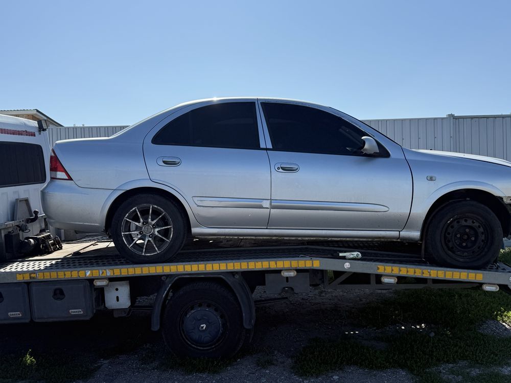 Двери nissan almera classic колір kxc