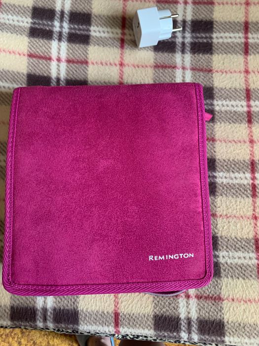 Электрические бигуди Remington.