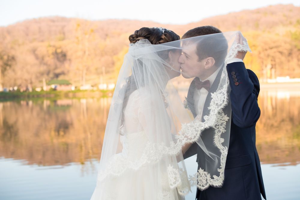 Весільне плаття в комплекті з фатою та рукавичками