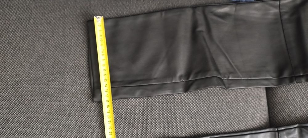 Czarne nowe skórzane cieple spodnie/getry