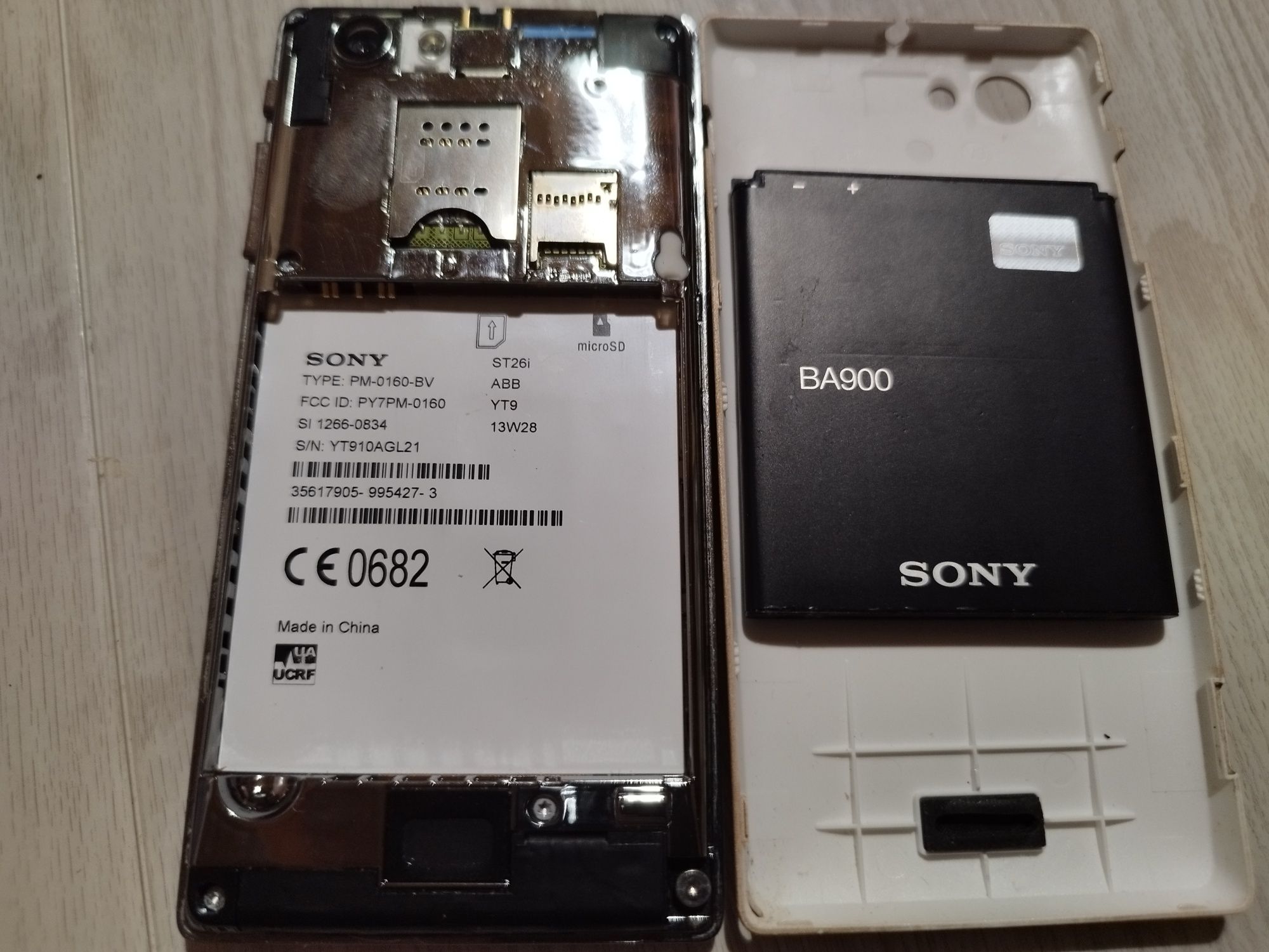 Телефон Sony  st 26i