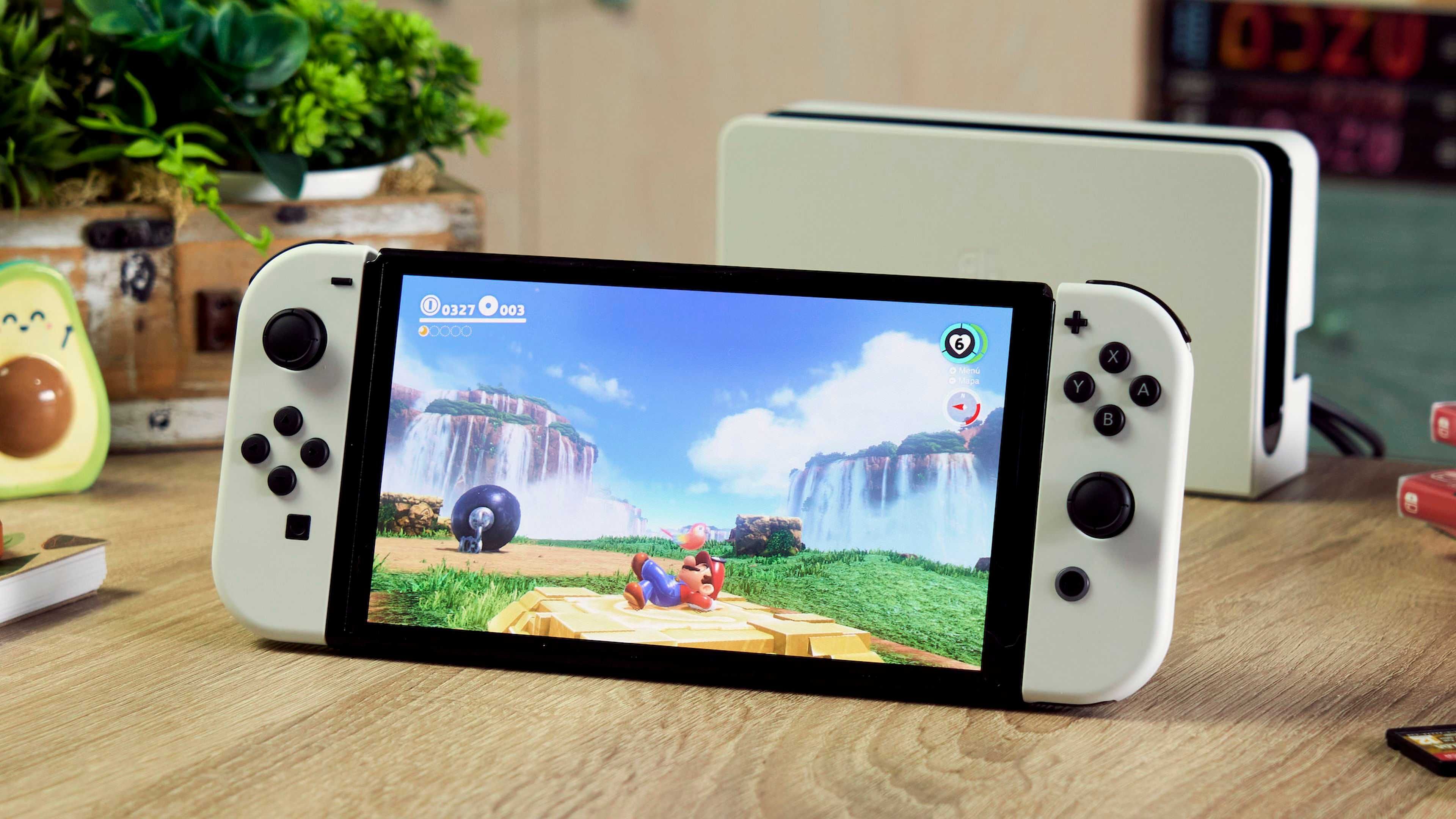 Consola Nintendo Switch OLED, 2 jogos e acessórios (como nova!)
