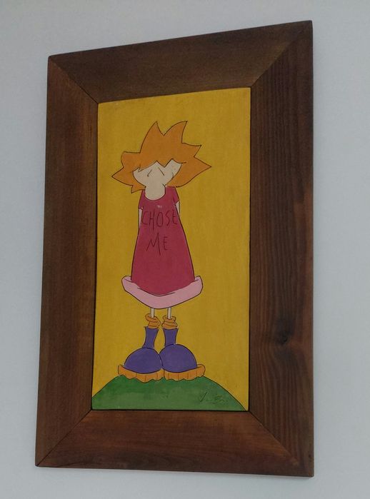 Quadros infantis  manufaturados em barro com molduras em madeira.