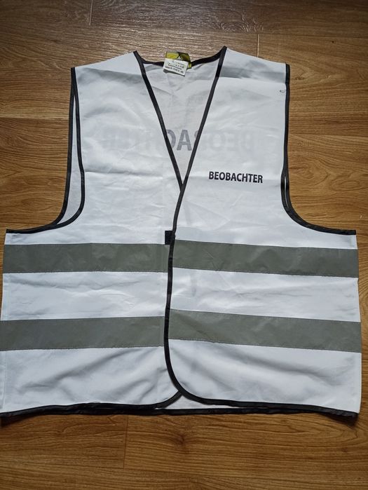 Попереджувальний світловідбиваючий жилет