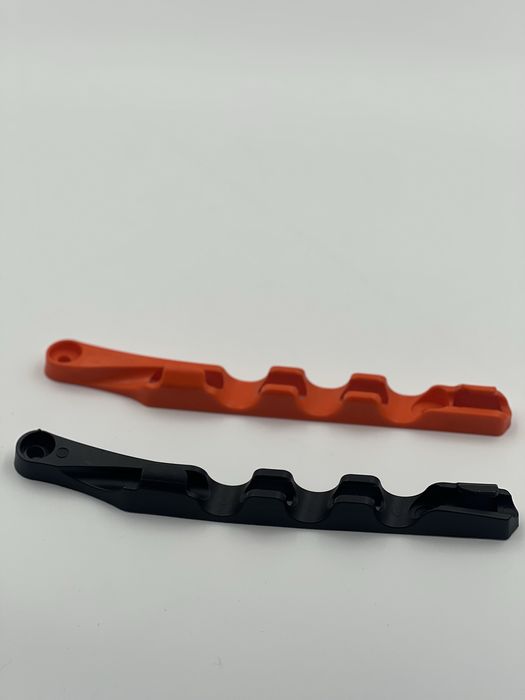 Тримач гідравлічного шланга на задній маятник