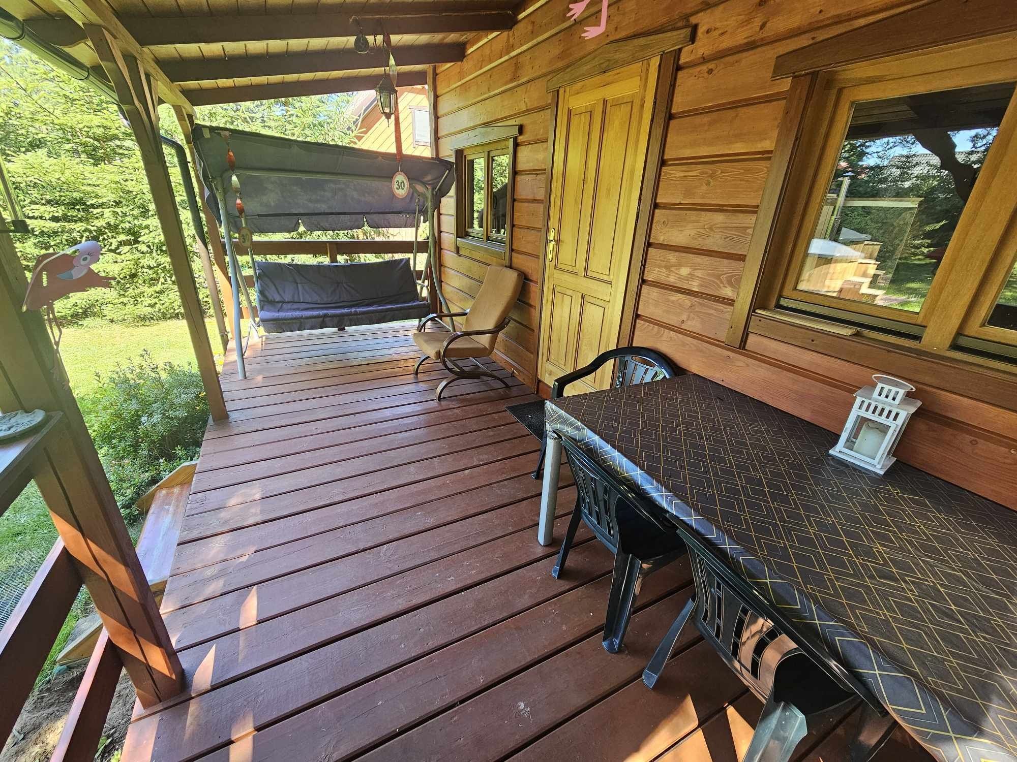 Domek z balią jacuzzi nad jeziorem wolne terminy