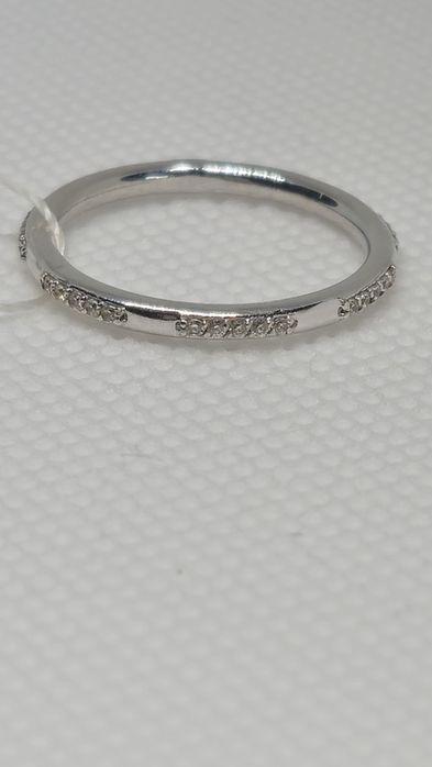 Каблучка з білого золота. Нова. Sova.