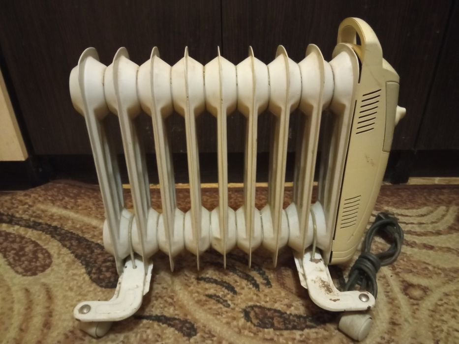 Масляный обогреватель электрический "Saturn", ST-OH1246,1000вт.