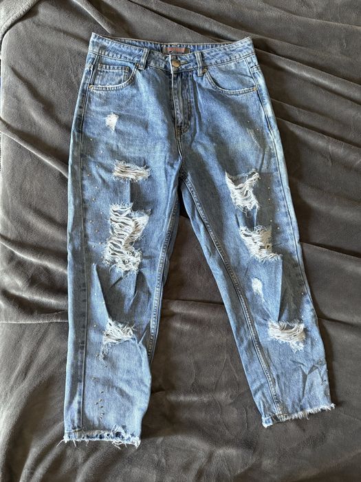 Рваные джинсы женские