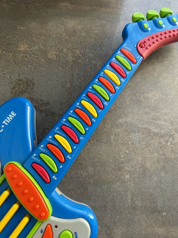 Elektryczna gitara grająca zabawka interaktywna niebieska gra instrume