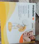 Молокоотсос Medela Mini Electric
