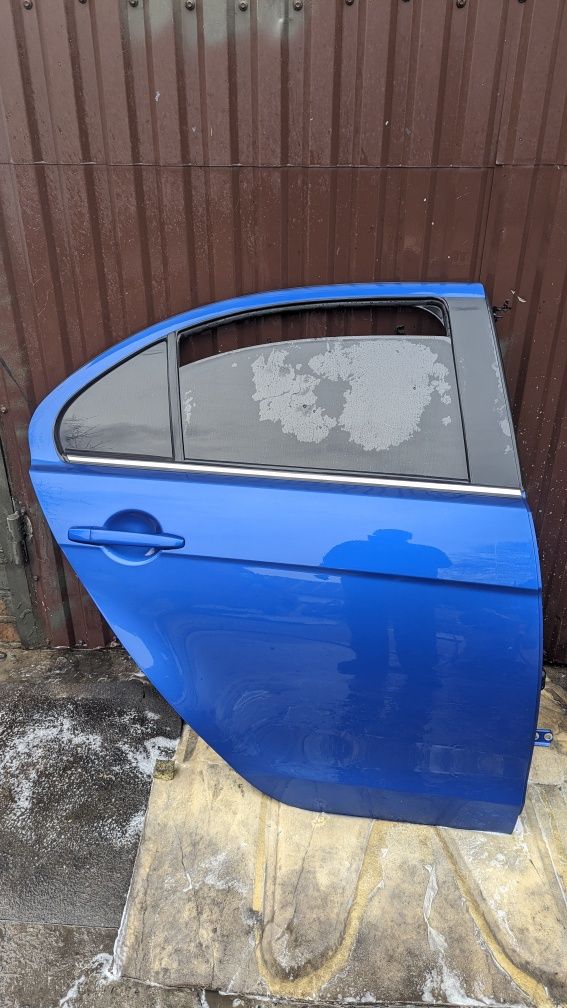 Задні двері ліві, праві Mitsubishi Lancer 10, X Ланцер седан