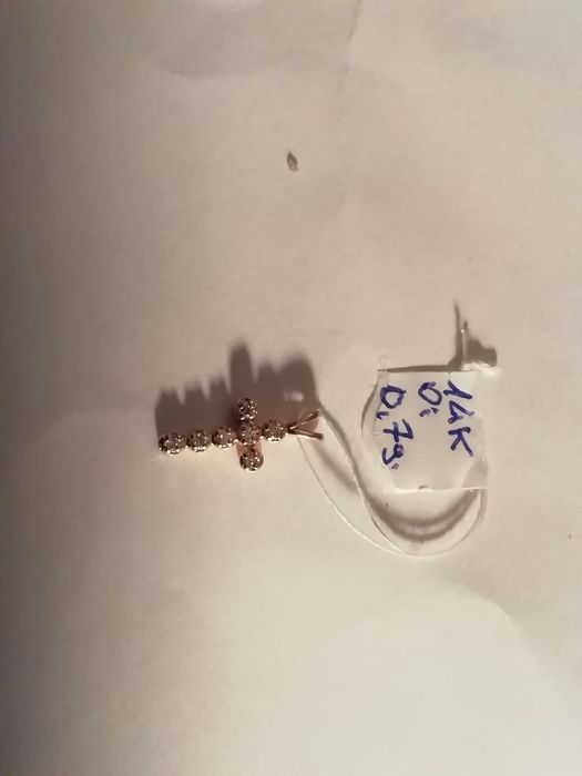 Krzyżyk złoty pr 14 K z diamentami  wg. 0,7 g. mały