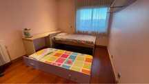 quarto solteiro com 2 camas