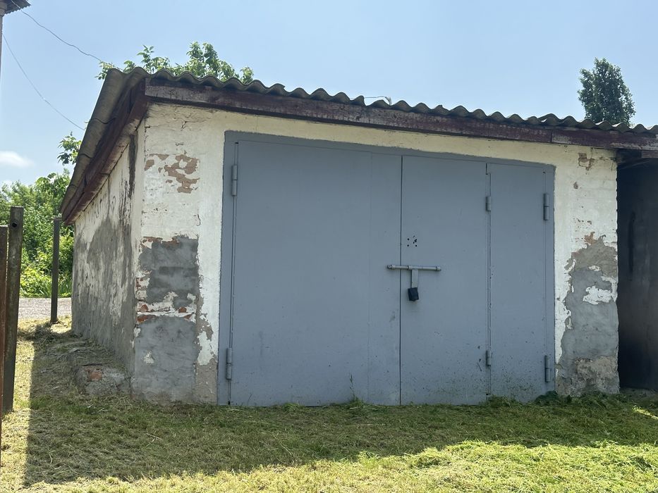 Продаж земельної ділянки з гаражем під комерцію, магазин