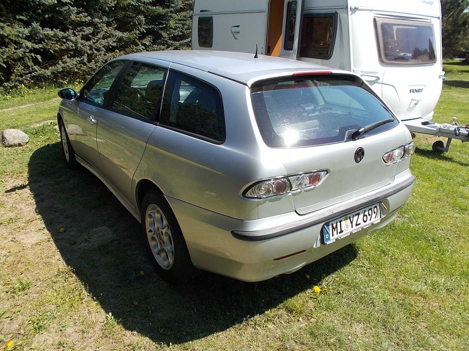 Alfa Romeo 156 1.9 JTD 110 KM Skóra Grigio chiaro 612 zderzak