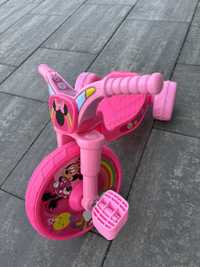 Minnie Rowerek trzykołowydźwiękami, różowy