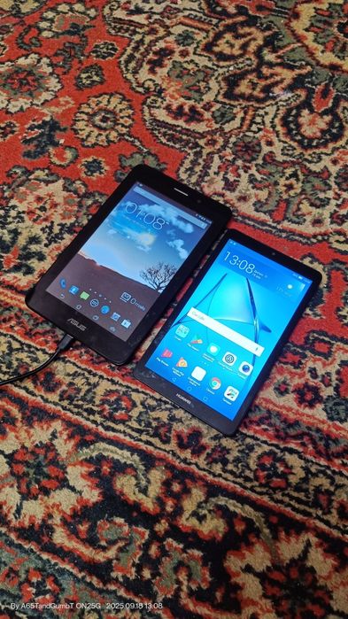Два Планшета Asus та Huawei