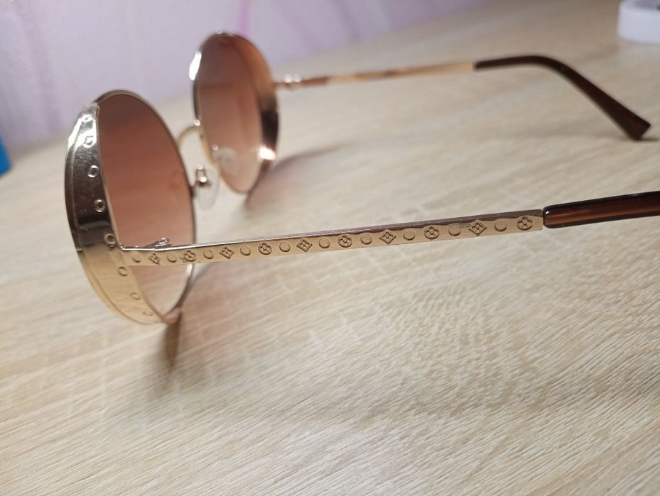 Сонячні окуляри,жіночі