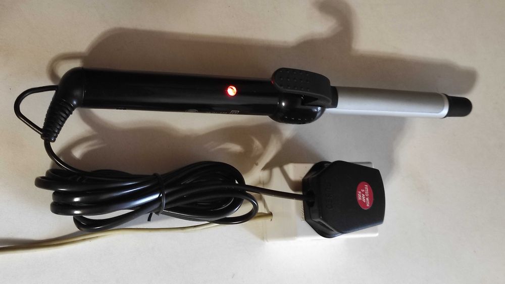 Плойка для завивки волос(щипці для накручування волосся,електрощипці)