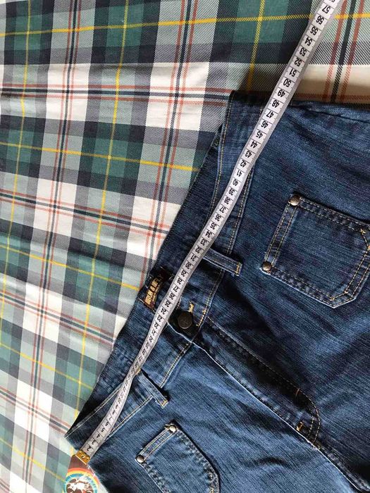 Новые джинсы широкие к низу клеш  Run&Fly размер 54-56.